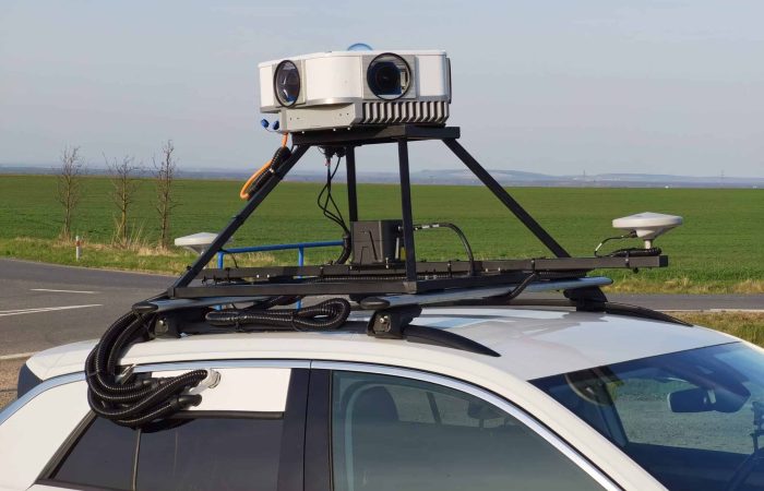 A side view of the Mosaic Viking 360 camera on car